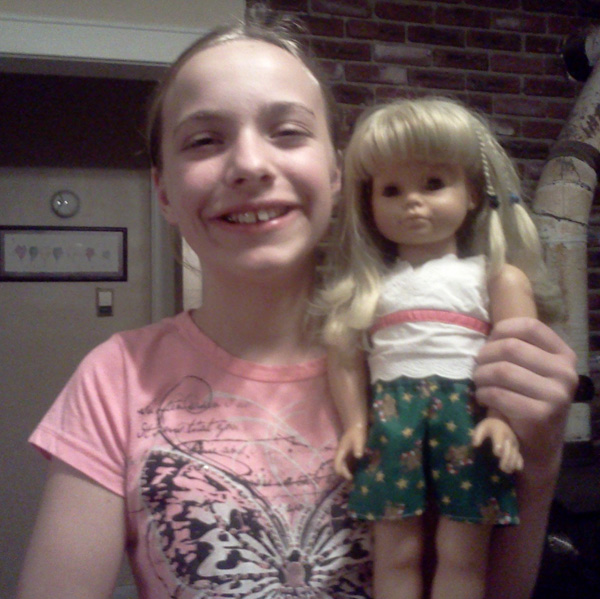Amy and her doll wearing her sports shorts Amy and her doll wearing her sports shorts