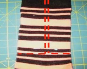10. Socks showing alternate sewing lines before cutting